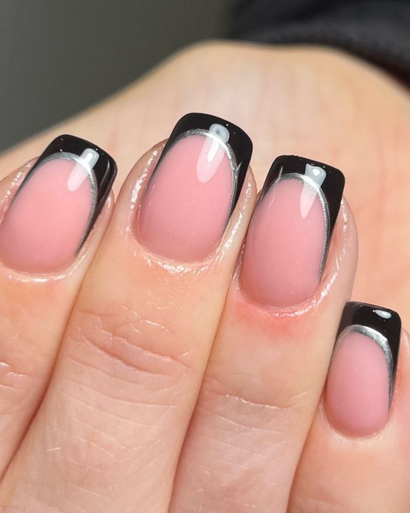 black nails with black tips 
black nails with silver