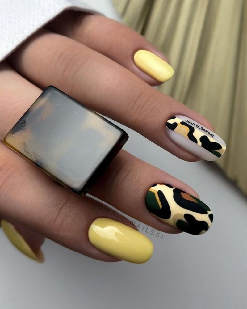 pastel yellow nails, animal print nail art, animal print nail designs