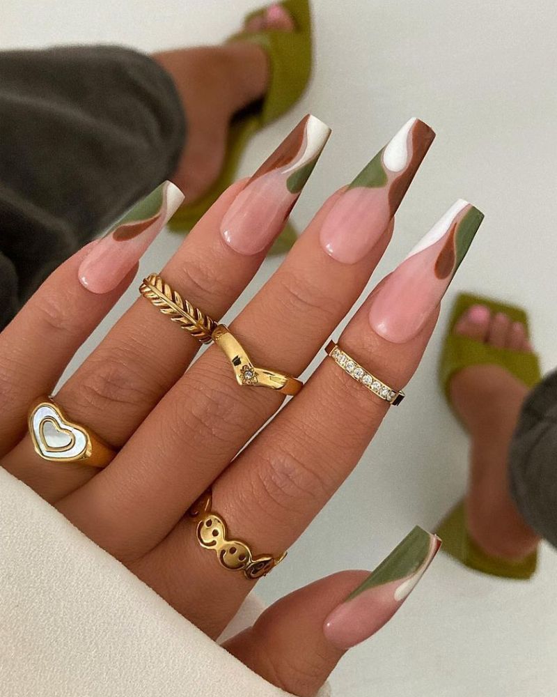 long coffin nails with fall nail art in green, white and brown