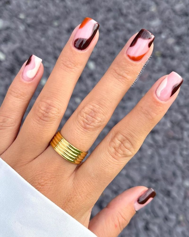 simple fall nail designs with orange and brown nail art