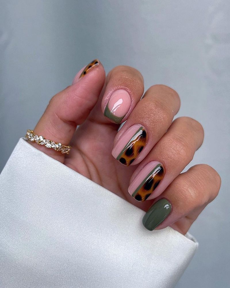 turtoise shell nail art on olive green nails