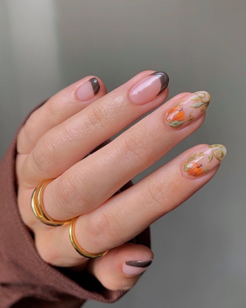 pumpkin nail art for fall on brown french manicure