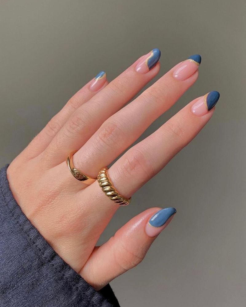 blue fall nails in a french manicure for an elegant look
