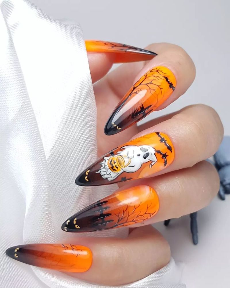 long stiletto nails for halloween with spooky nail art