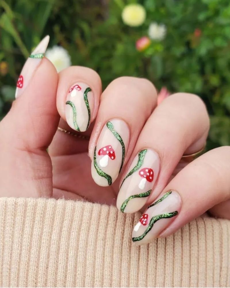 cute fall nail art on milky white base with mushrooms