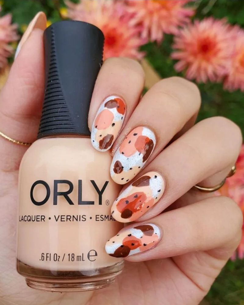 simple fall nail art design in fall colors, like orange and brown