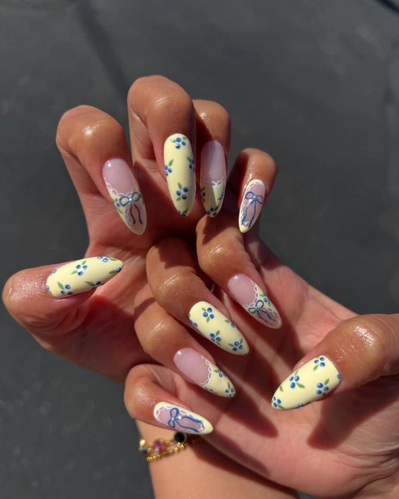 blueberry nail art, pastel yellow nails