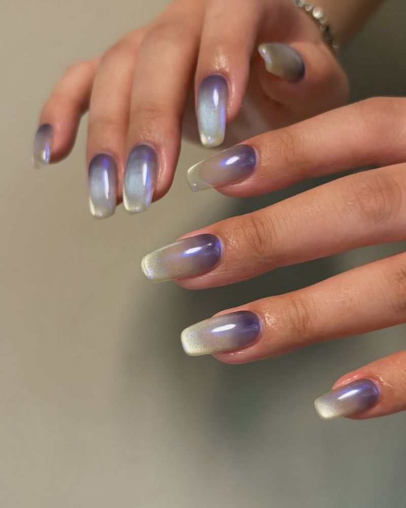 coffin shape silver cat eye nails design with lavender base