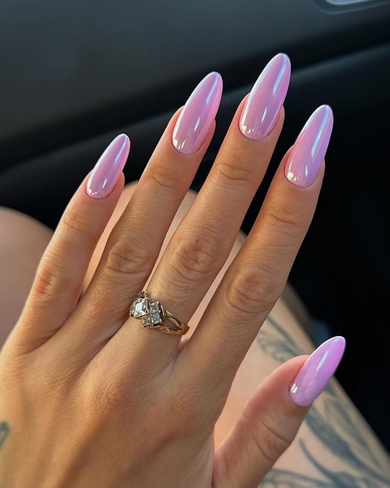 long almond nails with lavender base and chrome coat