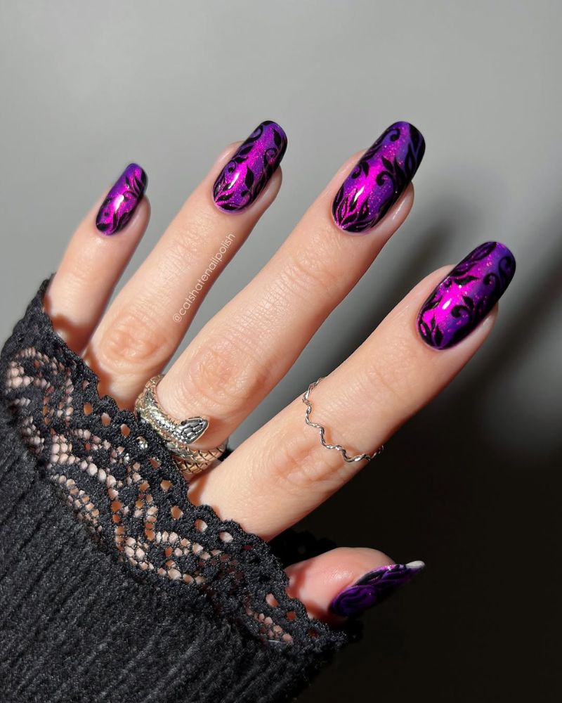 black purple nails with black nail art