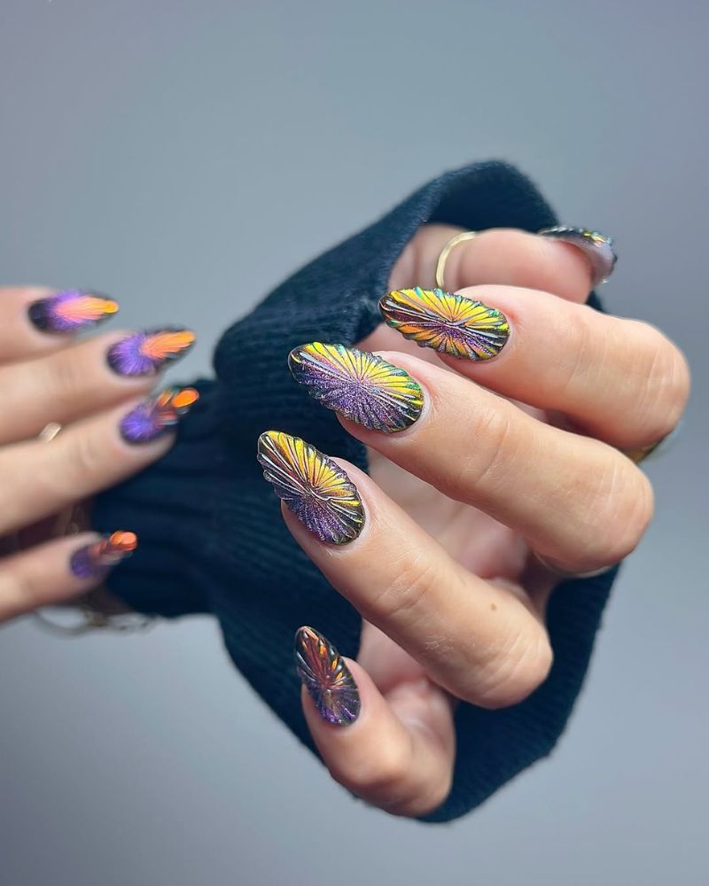 chrome purple nails with a black base and iridescent chrome