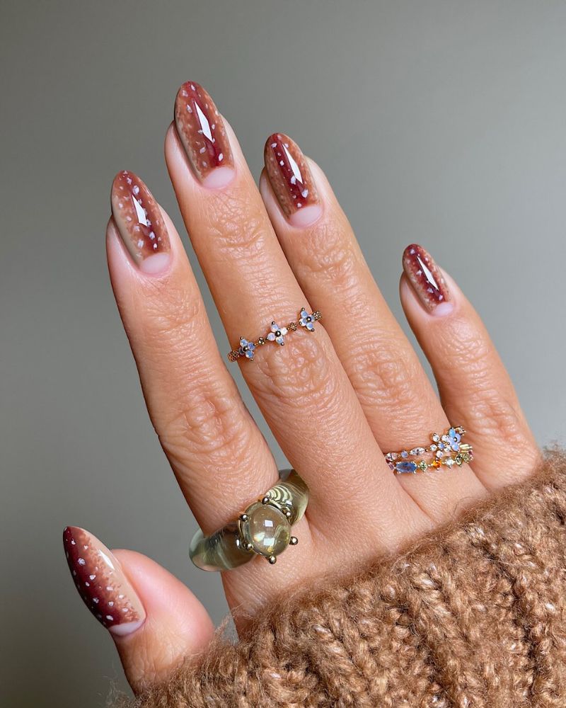 doe print nail art design on almond shape