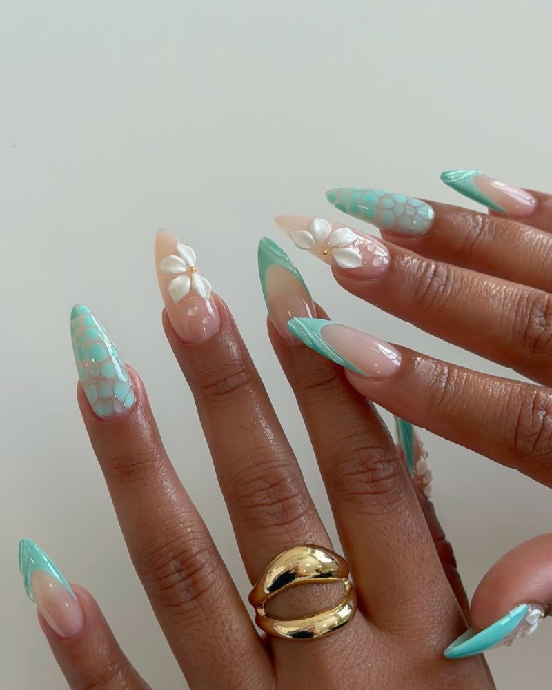 summer french nail art with teal texture tips and 3D white flower accents on long almond nails