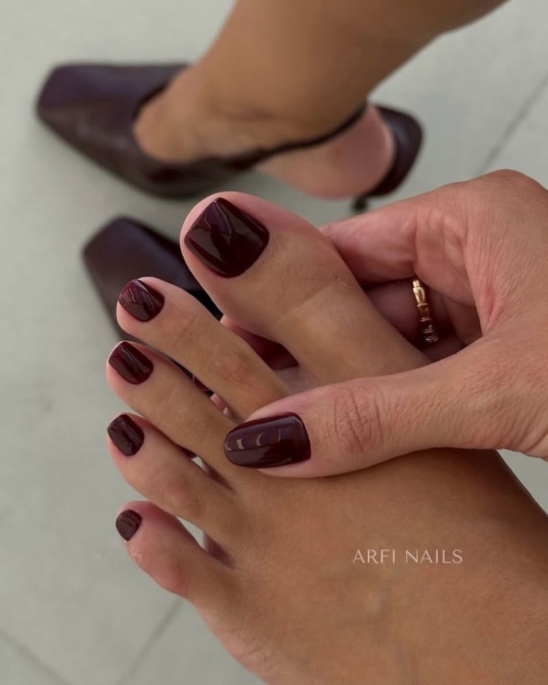 burgundy matching manicure and pedicure design