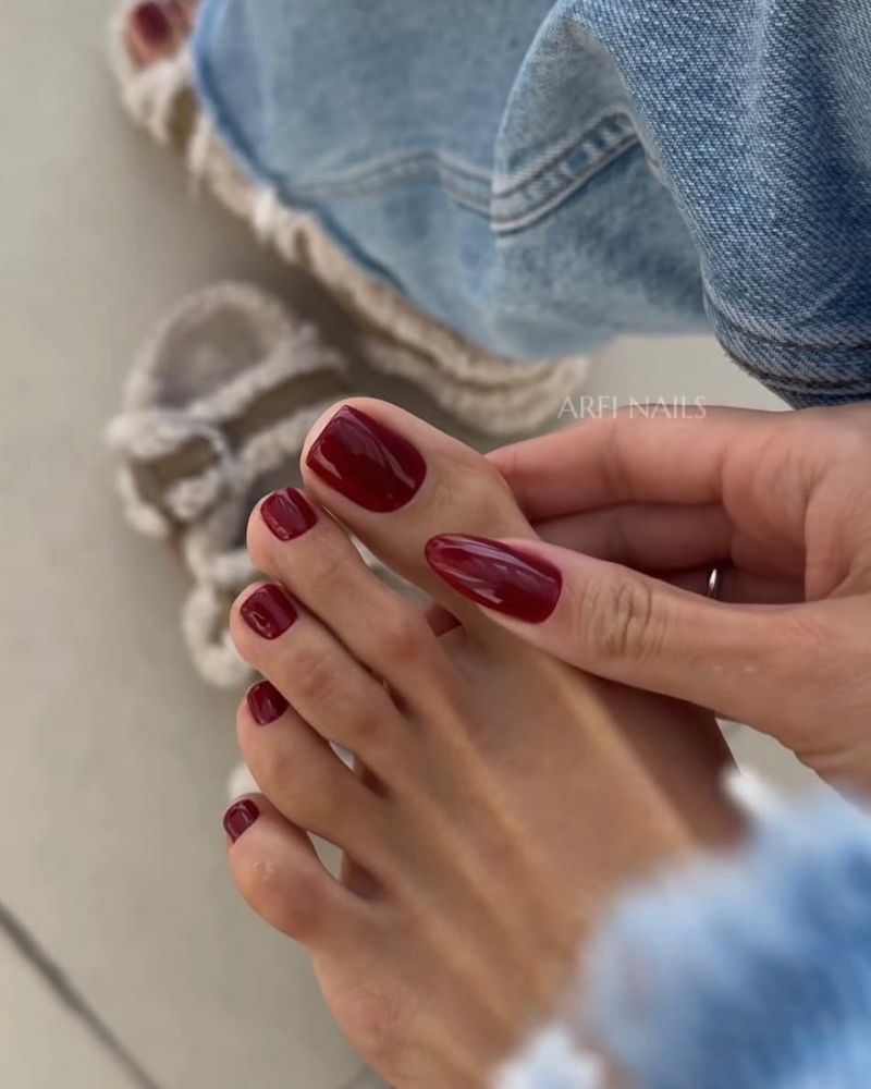 deep red manicure and pedicure