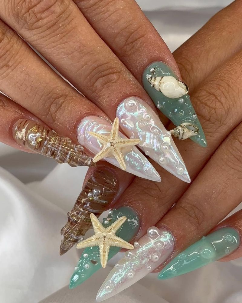 long stiletto nails with ocean nail art designs