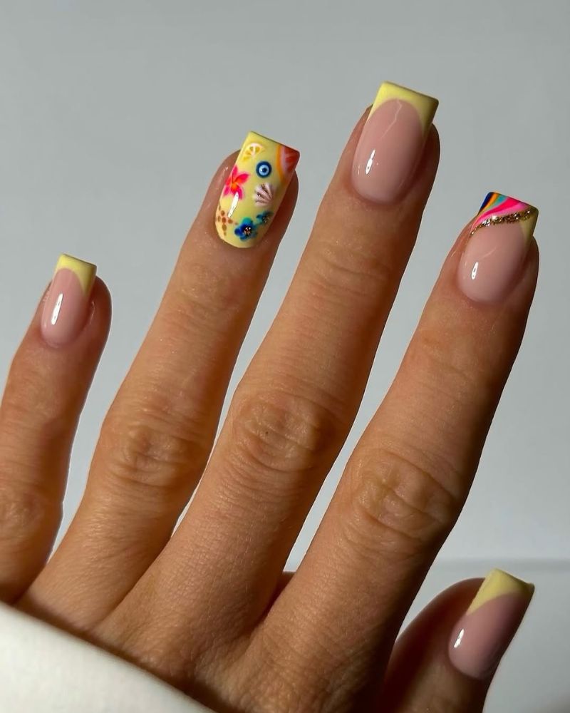 short square nails with butter yellow French tips and a tropical Talavera accent nail
