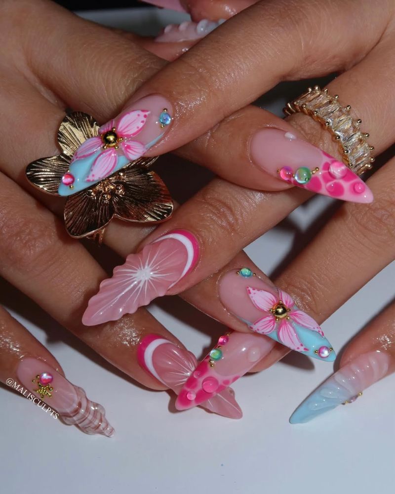 pink stiletto nails with 3D flowers designs