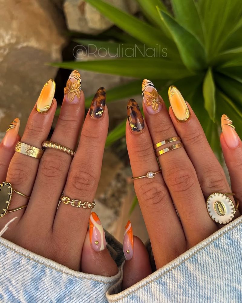 summer nail art designs tropical with gold 3D hibiscus tortoiseshell and zebra stripe nails