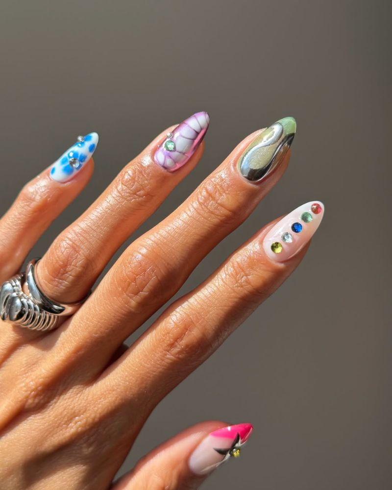 mixed summer nail art almond set with blue daisy chrome aura and rainbow rhinestone row