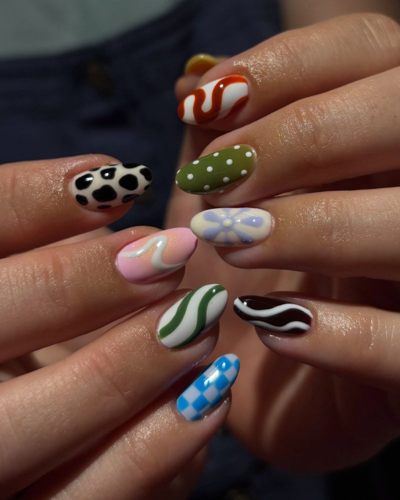 back to school nail designs y2k mix with cow print checkerboard and daisy