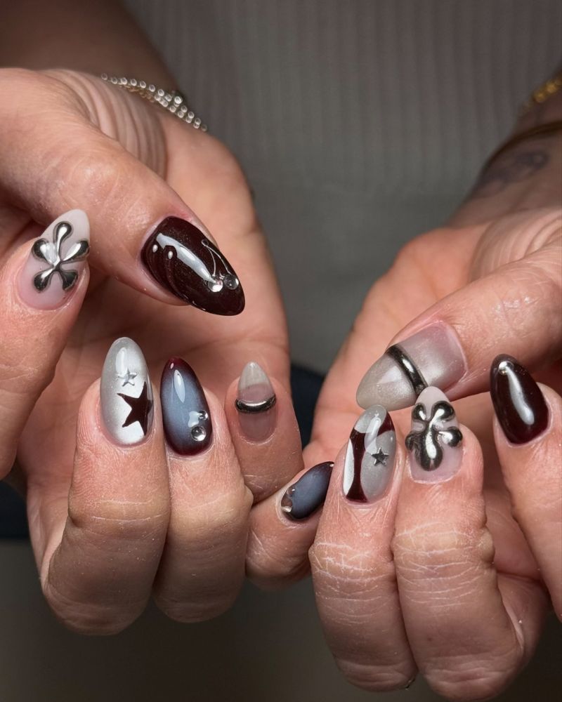 back to school nail designs dark academia set with burgundy chrome swirl and silver flower