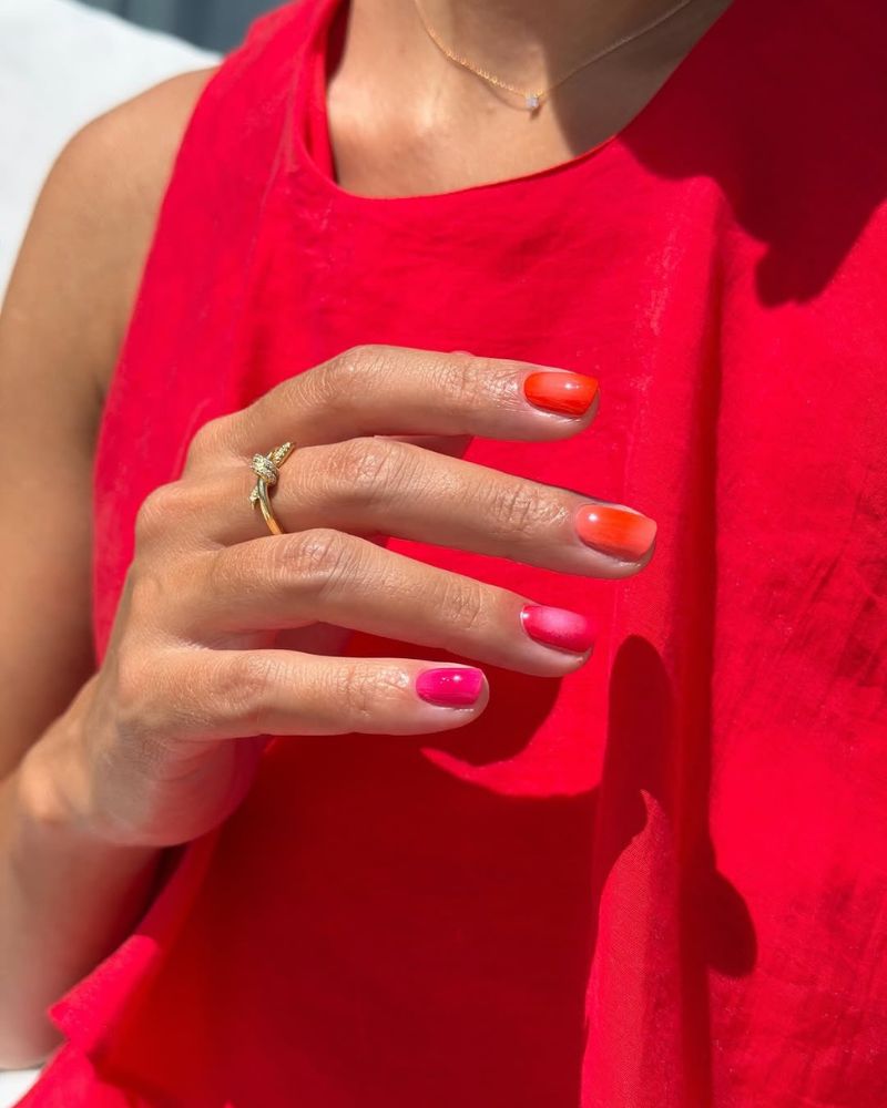 short square nails warm ombre gradient in red orange coral and hot pink
