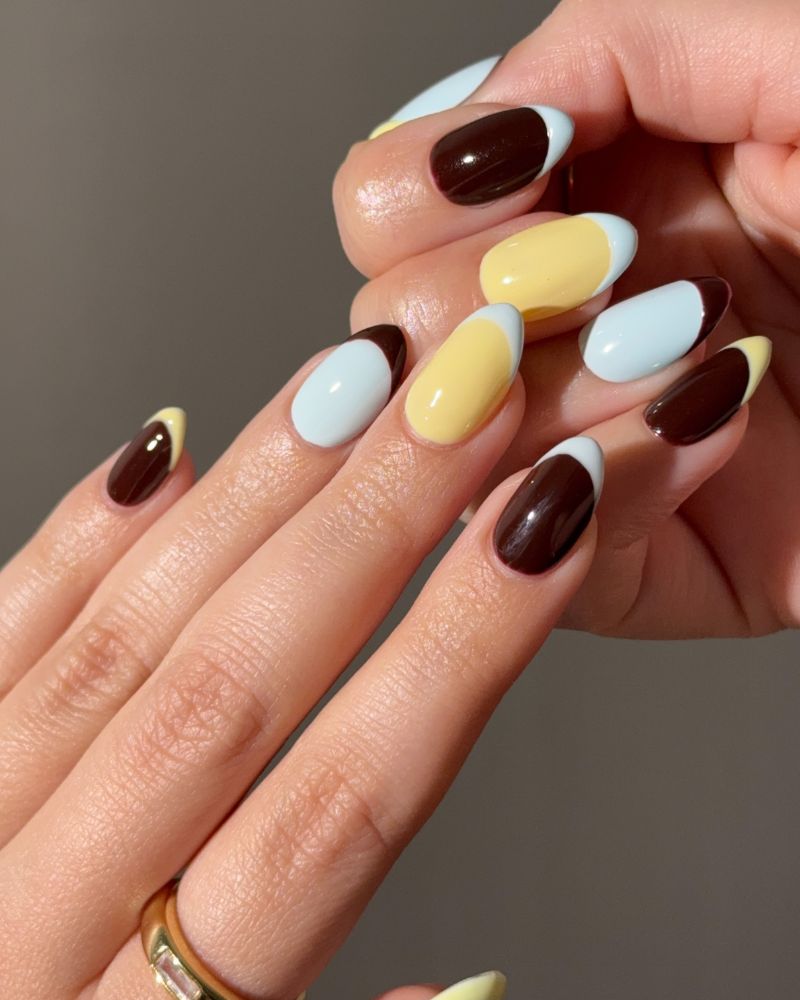 dark chocolate ice blue and butter yellow color block almond nails