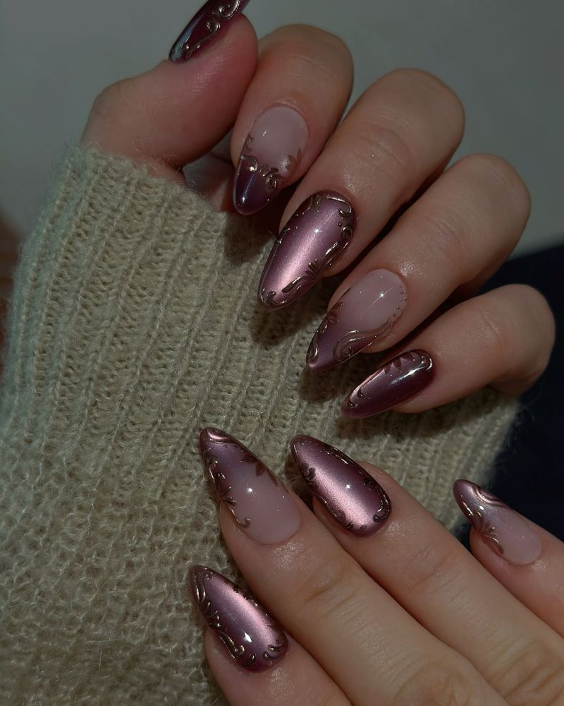 rose chrome and sheer nude jelly nails alternating with gold botanical line art