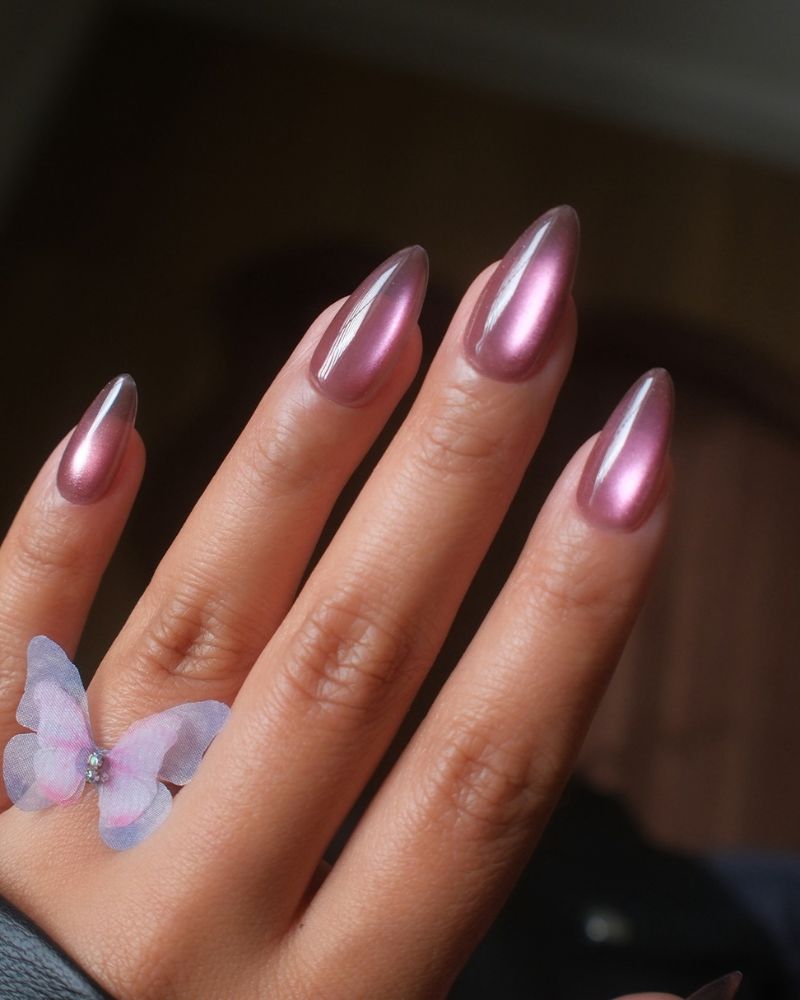 long stiletto rose-pink chrome mirror nails