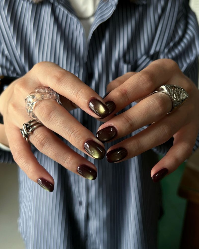 fall jelly nails deep espresso with an olive-gold cat eye stripe