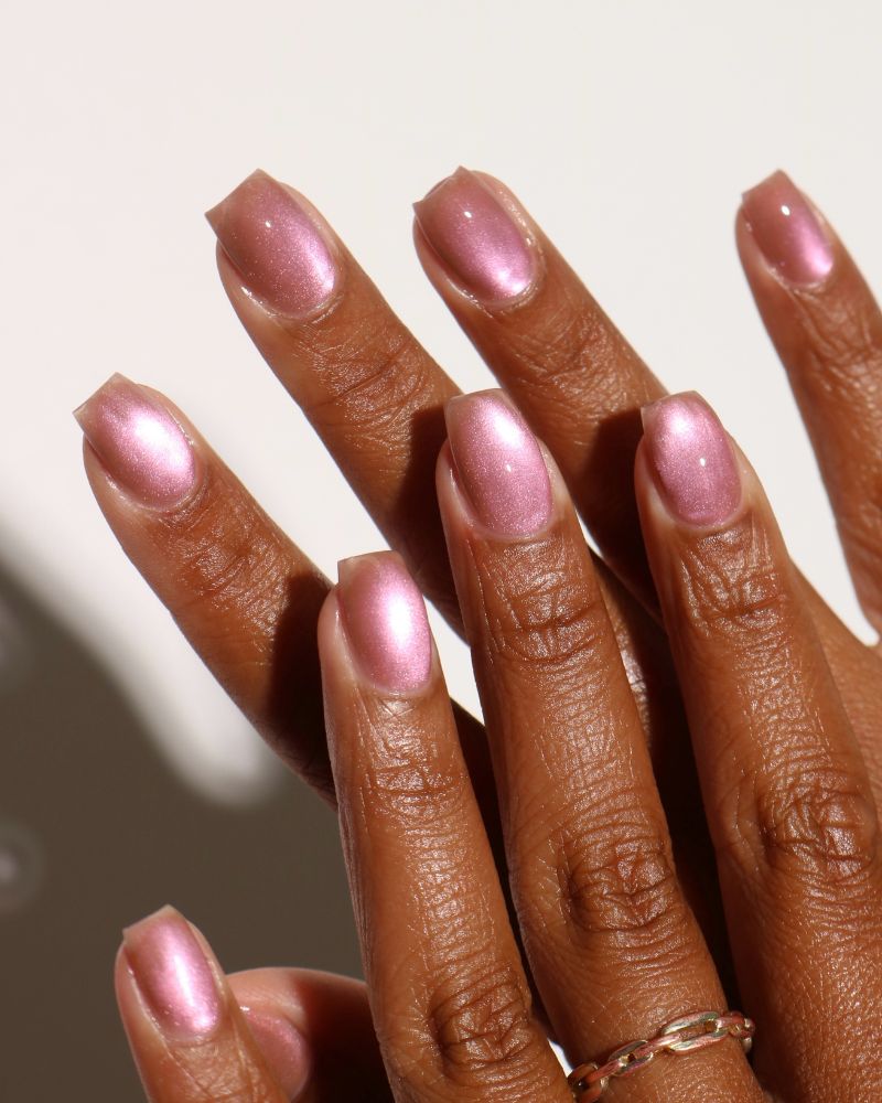 rose gold pearl shimmer short square nails on deeper skin tone