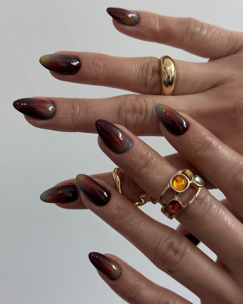 dusty muted aura long almond nails in smoky red lime yellow and grey mauve
