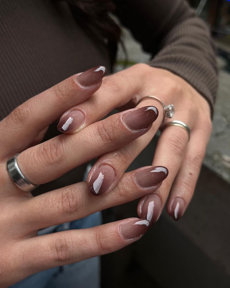 milky glass brown almond nails with white abstract brush stroke detail