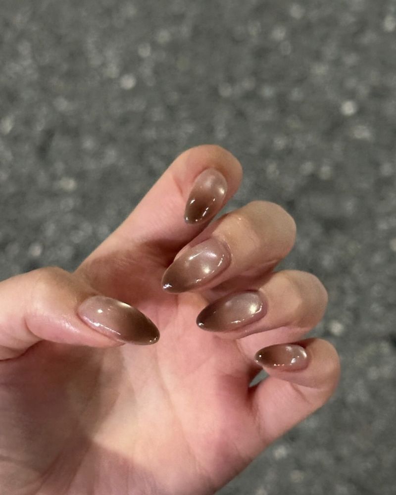 short almond nails in warm taupe mocha brown with pearl shimmer glaze light and sheer
