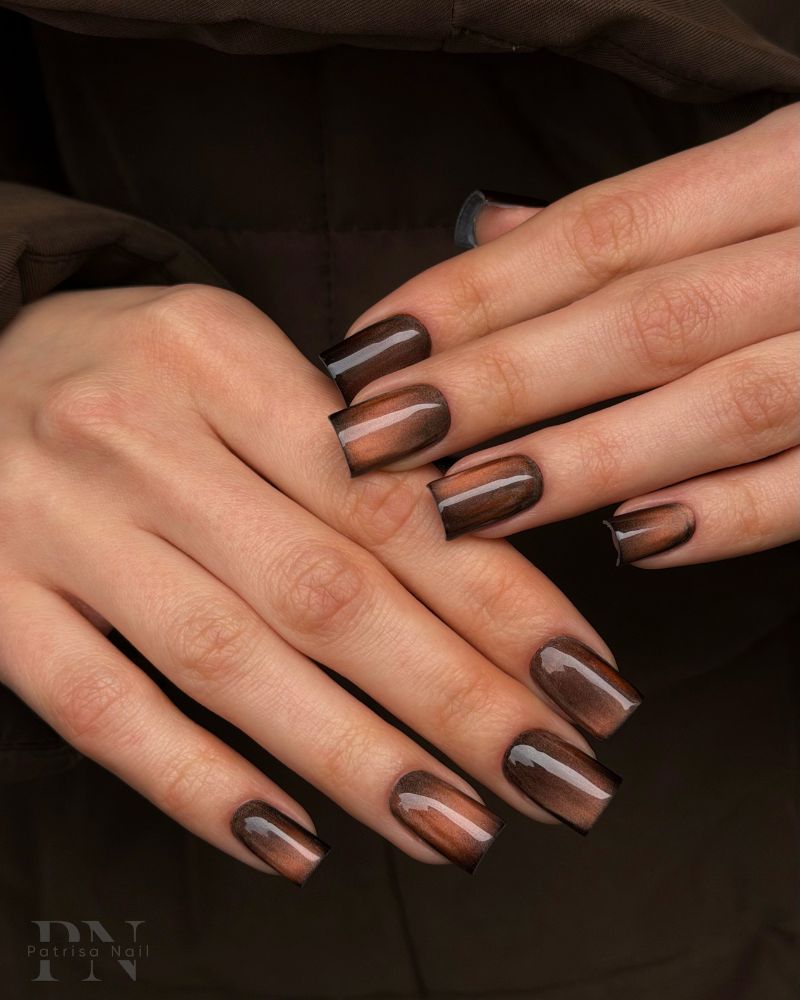 medium long square nails dark espresso brown with cat eye magnetic bronze copper shimmer stripe both hands khaki jacket patrisa nail